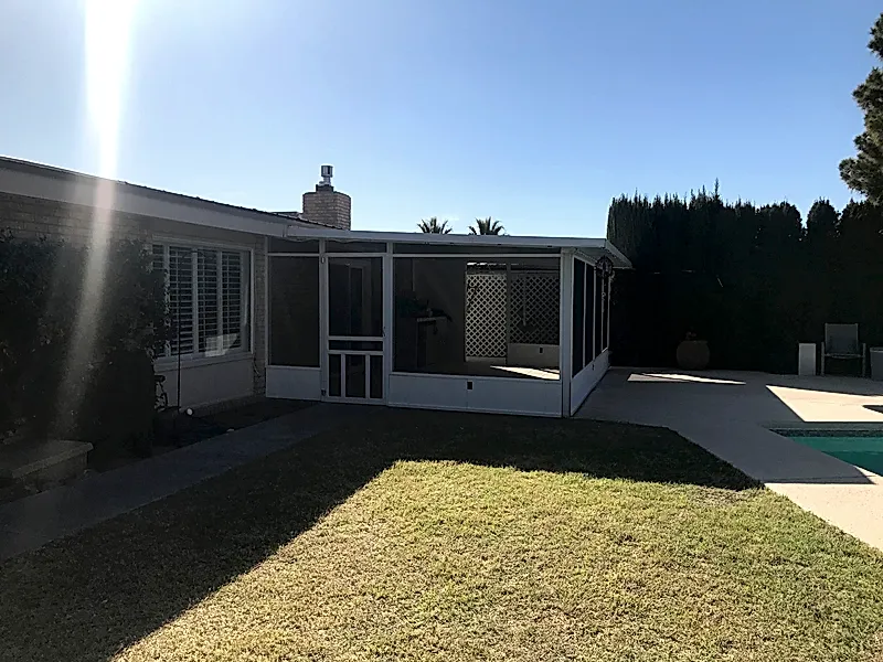 Finished enclosed patio with complete roof and walls