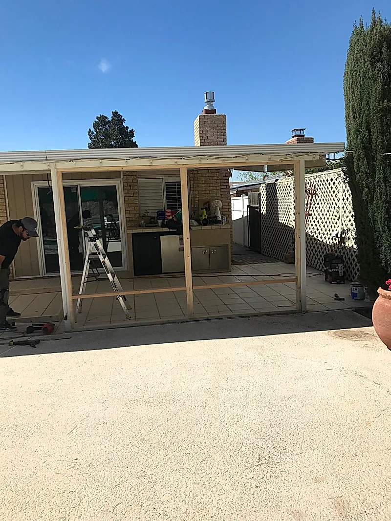 Patio frame before enclosure — bare framing stage